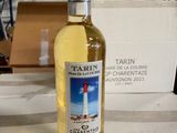 a bottle of wine that is sitting on a table
