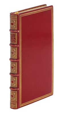 une image représentant un livre rouge orné de dorures