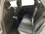 the back seats of a car with a seat belt in the back