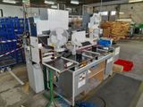 an image of a machine that is in a warehouse