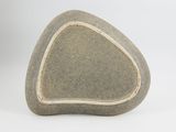 grey stone with a white line in the middle of it on a white surface