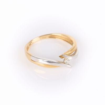 Bague croisée en or de deux tons sertie d'un diamant taille … - Photo 1