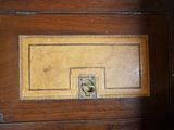 a close up of a wooden door with a lock on it