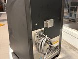 a machine that is sitting on a table in a room