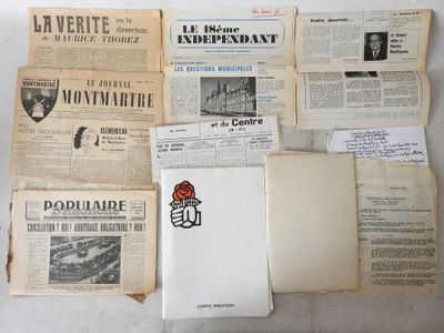 a lot of old newspapers that are on the table