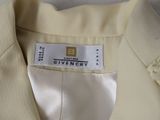 a close up of a white shirt with a label on it