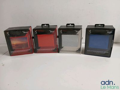 three boxes of different colors of a cell phone on a white surface