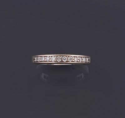 a diamond half - eternity ring, by van cleef