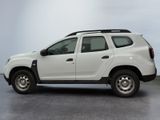 a picture of a white dacia parked in a garage