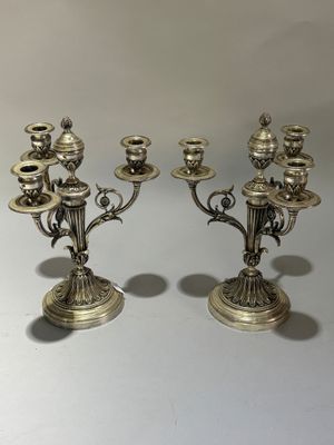 paire de candélabres anciens en métal argenté