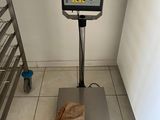 an image of a scale with a bag on it