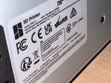 a close up of a laptop with a sticker on it