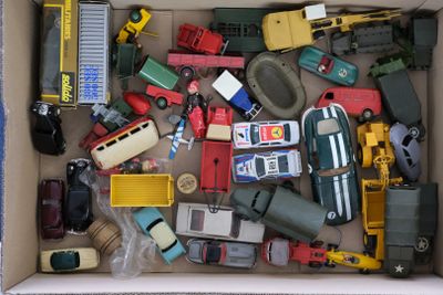 a box full of toy cars and trucks in it