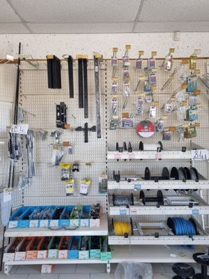 a room with a bunch of tools on the wall