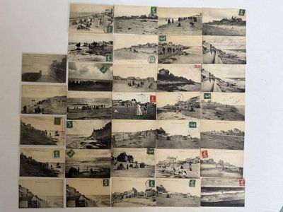 de nombreuses photos de personnes accrochées au mur de cette pièce