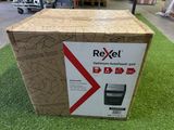 the box is empty and ready to be opened on the grass