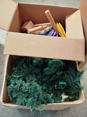 a cardboard box with a bunch of christmas trees in it