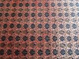 a large rug on the floor in a room