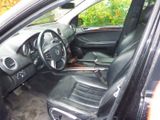 a picture of the inside of a car with the door open