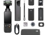 a camera and other accessories laid out on a white surface