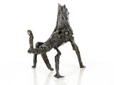 an image of a bronze sculpture of a dog on a white background