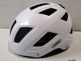 the helmet is white and has a black stripe on it