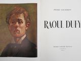 an image of a book with a picture of a man in a suit