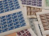a lot of stamps that are on a table