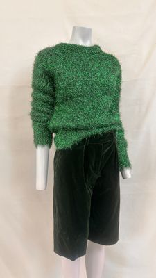 green sweater and black shorts on mannequin mannequin mannequin mannequin mannequin mannequin mannequin mannequin manne