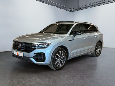 the new volkswagen t - rocch suv is displayed in a showroom