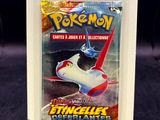 a close up of a pokemon trading card in a package