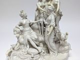 an image of a statue of a group of people on a white surface