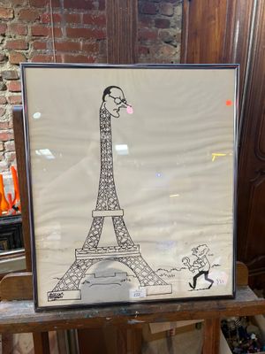 a picture of a picture of a man standing in front of the eiffel tower