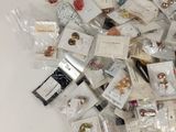 a pile of small items that are on a table