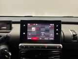 a picture of a car dashboard with a touch screen