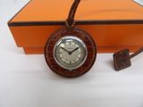 an orange box with a clock and a key on it