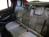 the back seats of a car are black and grey in color