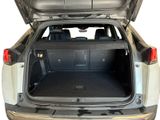 the back of a car with its trunk open showing the cargo compartment