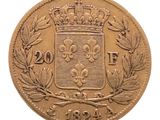 Gros plan sur une pièce de monnaie ornée d'une couronne