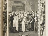 an old book with a picture of a group of people