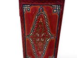 an image of a red cabinet with a floral design on it