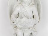 statue of an angel holding a basket of flowers on a white background