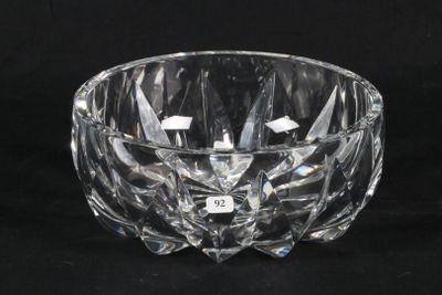 a crystal bowl with a number on it on a black background