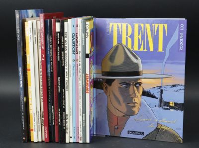 a lot of books that are sitting on a table
