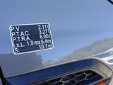 a close up of a car ' s license plate on the back of a car