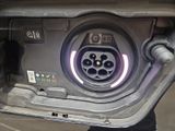 a close up of a car ' s interior with a car plugged in