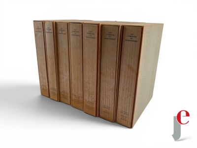 five books that are stacked on top of each other