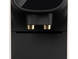 a black coffee machine with a gold logo on it