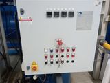 a machine that is sitting inside of a building