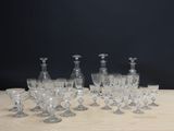 a lot of wine glasses sitting on a table